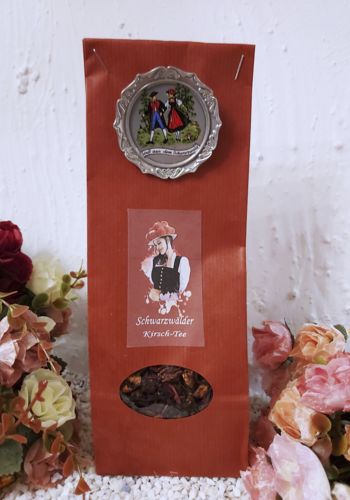 T 10016 Schwarzwälder Kirsch-Tee 100gr mit Teller-Motiv-Schwarzwaldpaar