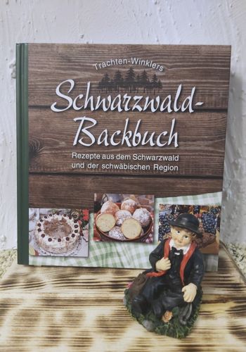 BB10023 Schwarzwald Backbuch mit Schwarzwald-Bub sitzend
