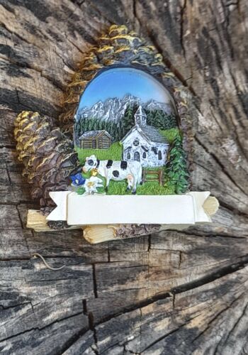 MAG1200 Tannenzapfen Panorama Kuh und Kirche