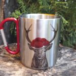 TH10012 Edelstahltasse Thermo Schwarzwald Hirsch mit Bollenhut