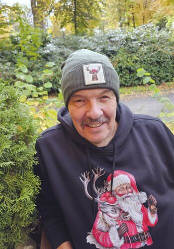 MÜT1001 Mütze Schwarzwald-Bollenhut Hirsch olivgrün