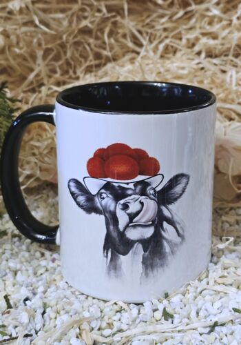 SCHWT2010 Schwarzwaldtasse Kuh mit Zunge innen schwarz, schwarzer Henkel